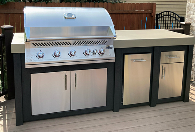 A grill attached to an outdoor island. Perfect for kick starting your outdoor kitchen.