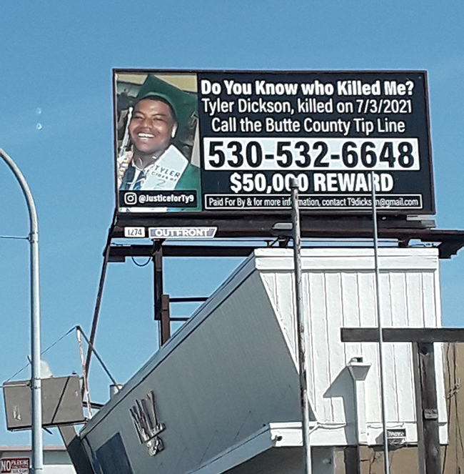 A billboard showing Tyler Dickson. People will info regarding his murder are asked to call 530-532-6648.