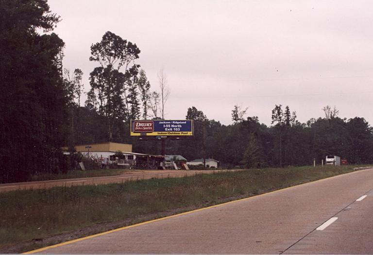 Photo of a billboard in Piney Woods