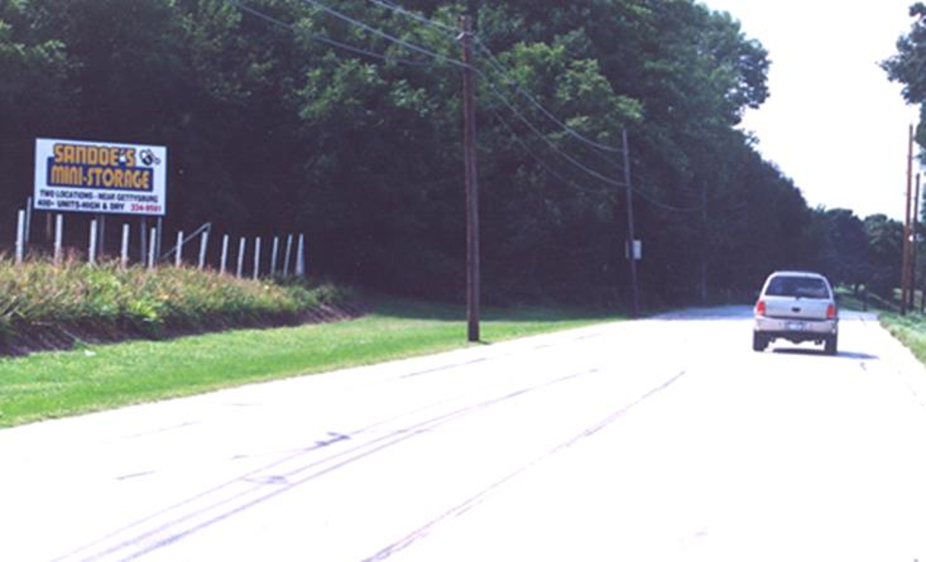 Photo of a billboard in Menges Mills